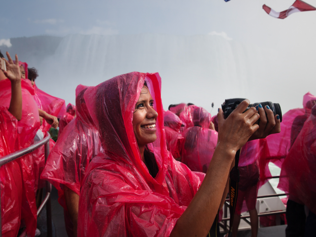 Woman in poncho at Niagara Falls