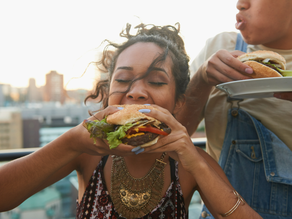 Woman eating burger