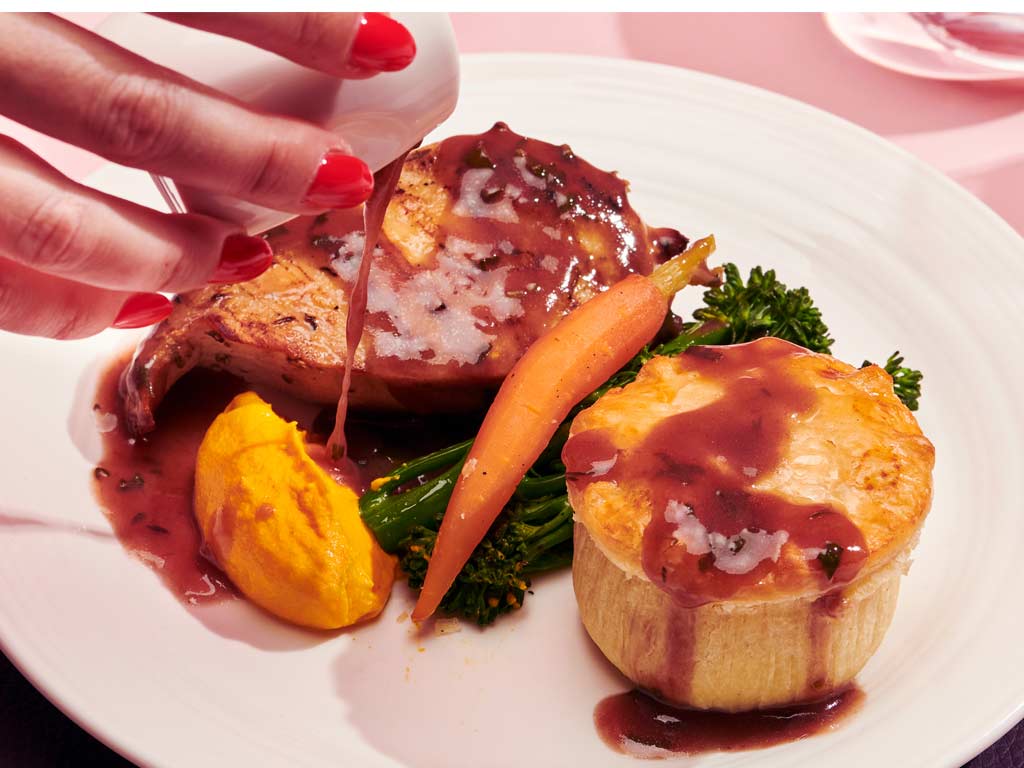 Chicken two ways - oven baked breast and mini pie with a cream herb chicken filling served with broccoli, carrot puree, baby carrots and chicken jus  