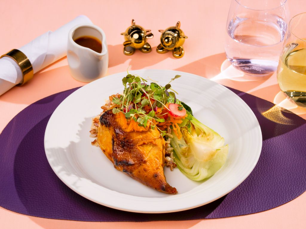 Pan roasted cod with panang sauce, coconut rice, edamame wit a carrot and radish salad