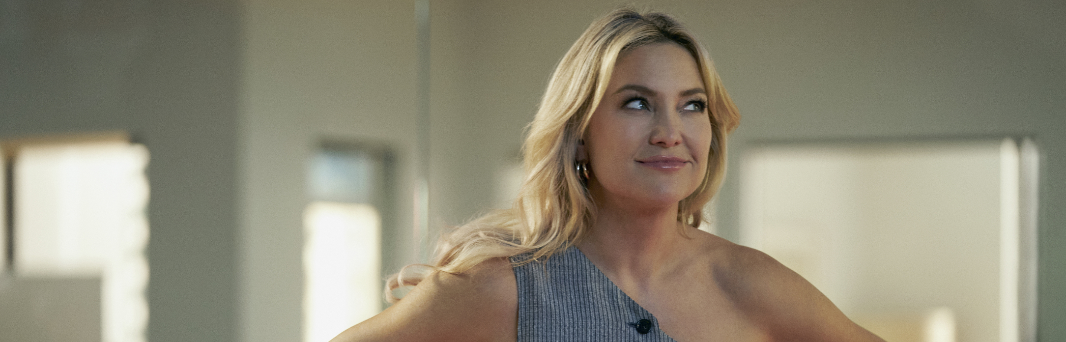 John Candy with his hands on his face