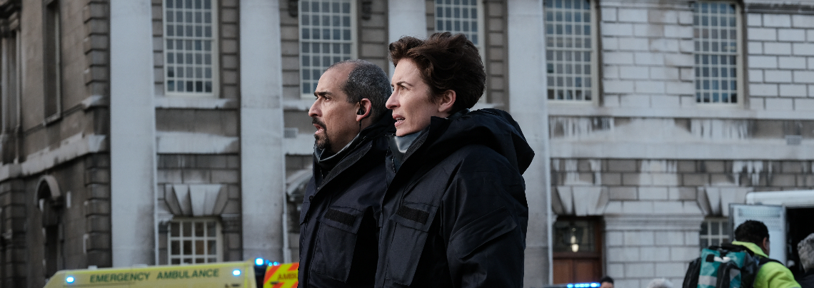 An image of an Elephant reaching its trunk out to a bus, from the TV show Asia